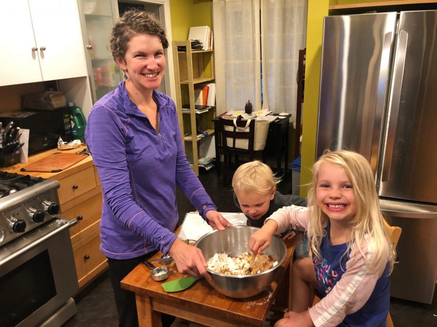 English Teacher Sarah Kreiner making cookies with her family (Photo courtesy of Sarah Kreiner)