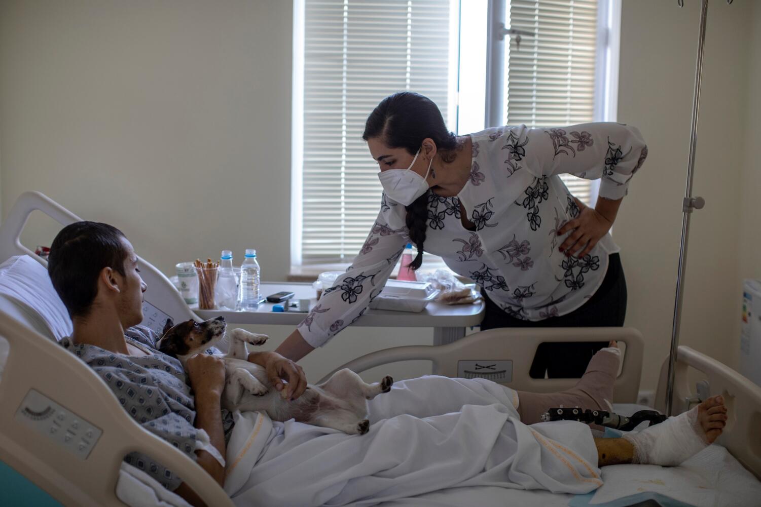 Former Eastside History teacher Nanor Balabanian helping wounded soldiers in Armenia.     Photo courtesy of Eric Grigorian from EVN News.