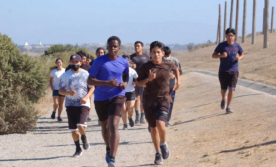 Cross Country team practicing at Byxbee Park before the friendly race on 
Aug. 31. (Photo courtesy of Tomas San Juan)