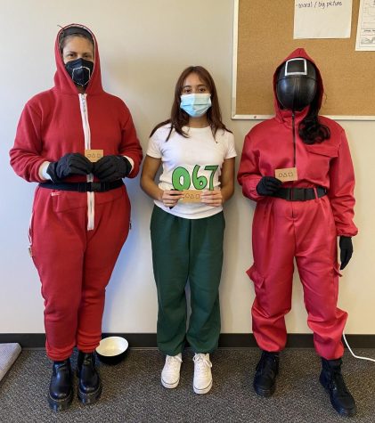 Senior Jasmine Tostado with English teachers Nohely Perez and Amy Reilly dressed up as Squid Game characters during Spirit Week on Oct. 30. (Photo courtesy of Linda Filo.)