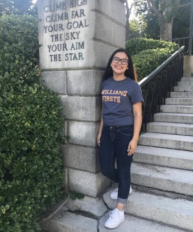 English teacher Nohely Peraza (Eastside class of 2016) stands near the main gate of her college, Williams College in Massachusetts