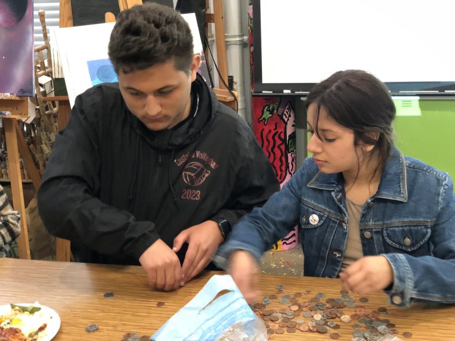 Interact Club President Uriel Velazquez-Leon and Vice President Stephany Urbina-Diaz count money for the Leukemia Drive during Interact Club