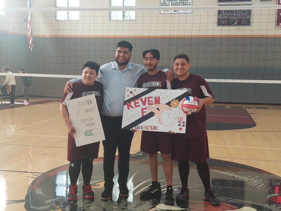 Seniors+Alexis+Martinez%2C+Keven+Florido+and+Uriel+Velazquez-Leon+taking+a+picture+with+their+volleyball+coach+Leo+Anaya+as+a+farewell+to+the+seniors.